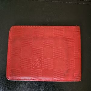 Red Louis Vuitton wallet